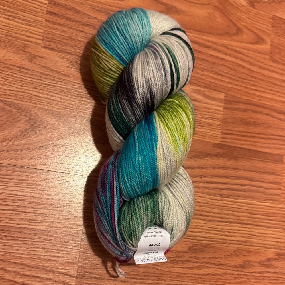 1 skein Miss Babs Yowza.  Beautiful color and super squishy See pics below.  NWT